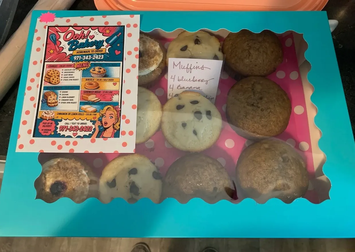 A box of a dozen mixed muffins: blueberry, banana and chocolate chip